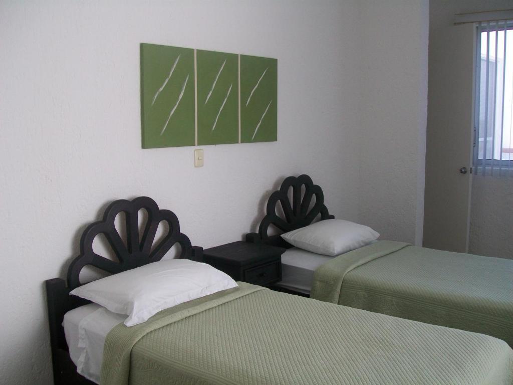 ลาส กาวิโอตัส โฮเทล แอนด์ สวีท Aparthotel แคนคูน ภายนอก รูปภาพ